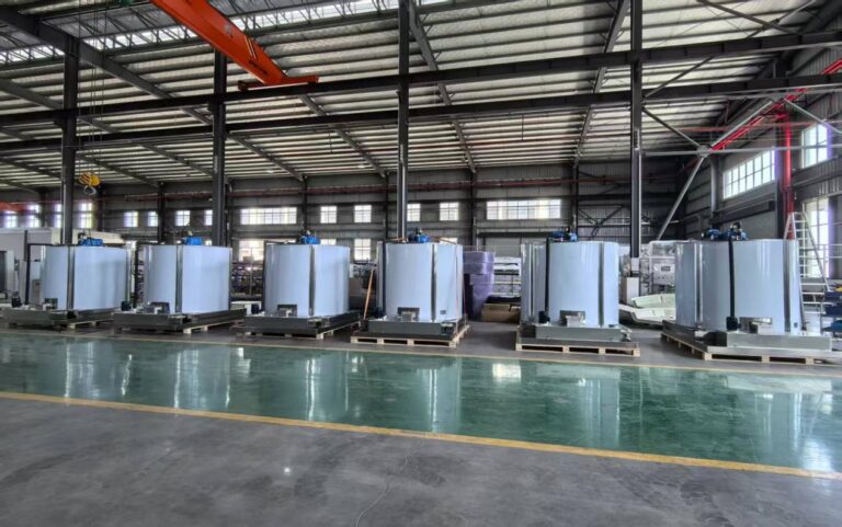 Industrial flake ice evaporators arranged in the Mike Ice production workshop